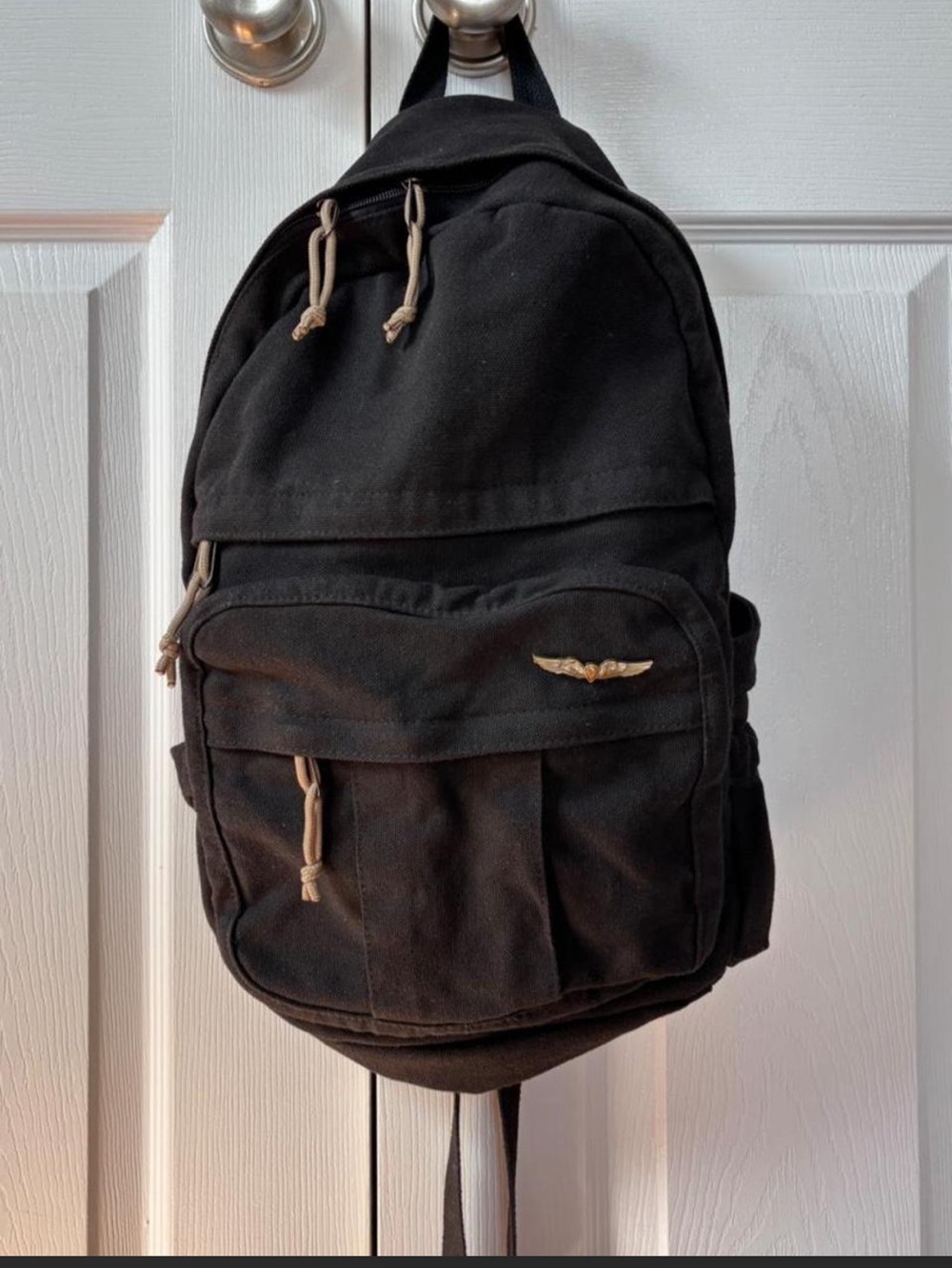 Black Canvas Backpack with Wing Emblem